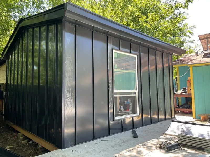 Black standing seam metal wall panels for Roof Inspection in Palmer